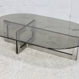 Coffee table with steel base and smoked glass slab. Circa 197