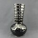 The Foulon, vase with iridescent black cover
