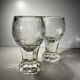 Pair of stemmed glasses in thick crystal, Bohemian, circa 1900