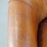 Sheep leather club chair in a cognac color with patina