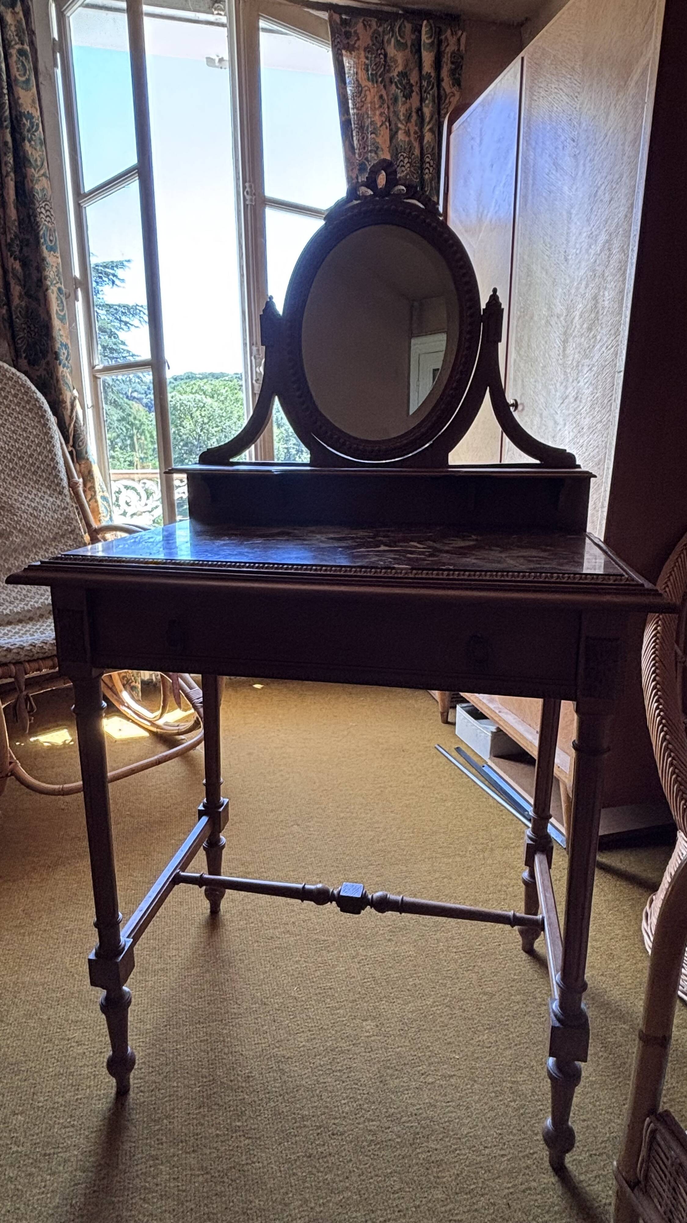 Antique oak and red marble dressing table with a swivel mirror.