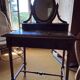 Antique oak and red marble dressing table with a swivel mirror.