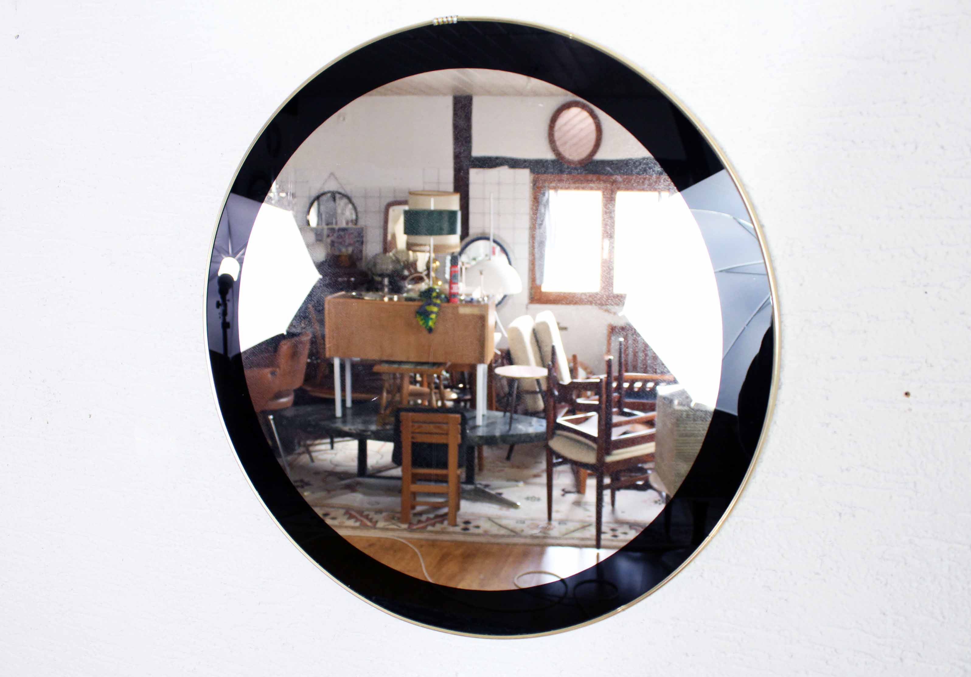Black and gold 60s round mirror