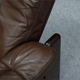 Pair of armchairs and ottoman in leather, 1970