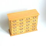 Small cabinet with compartments
