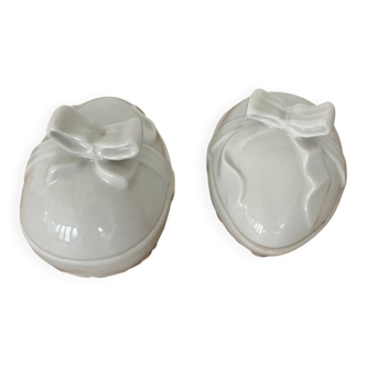 Pair of porcelain egg-shaped pocket trays