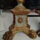 Pair of antique candlesticks in carved wood with acanthus leaf decoration