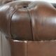 Fauteuil club Chesterfield en cuir de vachette marron de style anglais