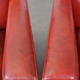 Set of 2 red-colored design armchairs made of sheepskin leather