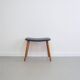 Tabouret en teck et cuir noir