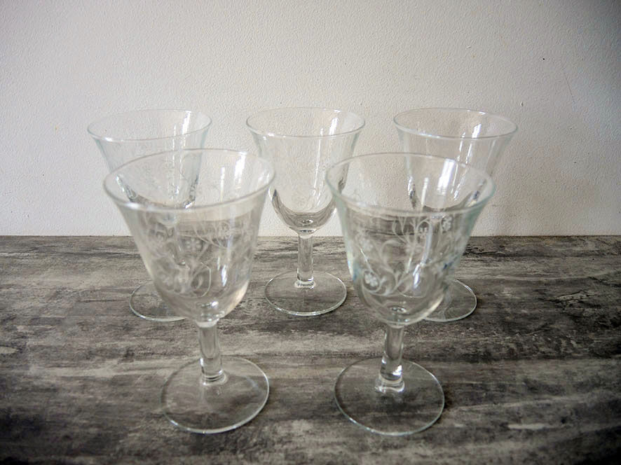 5 old transparent foot glasses – white floral pattern