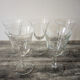 5 old transparent foot glasses – white floral pattern