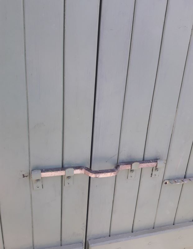 Pair of wooden iron hanging shutters