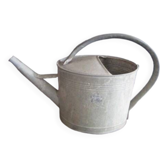 Old zinc watering can