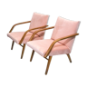 Paire de fauteuils années 60 retapissés velours rose poudré