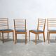 Series of 4 vintage chairs in wood and skaï