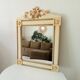 Vintage bohemian mirror from the 80s in carved wood.