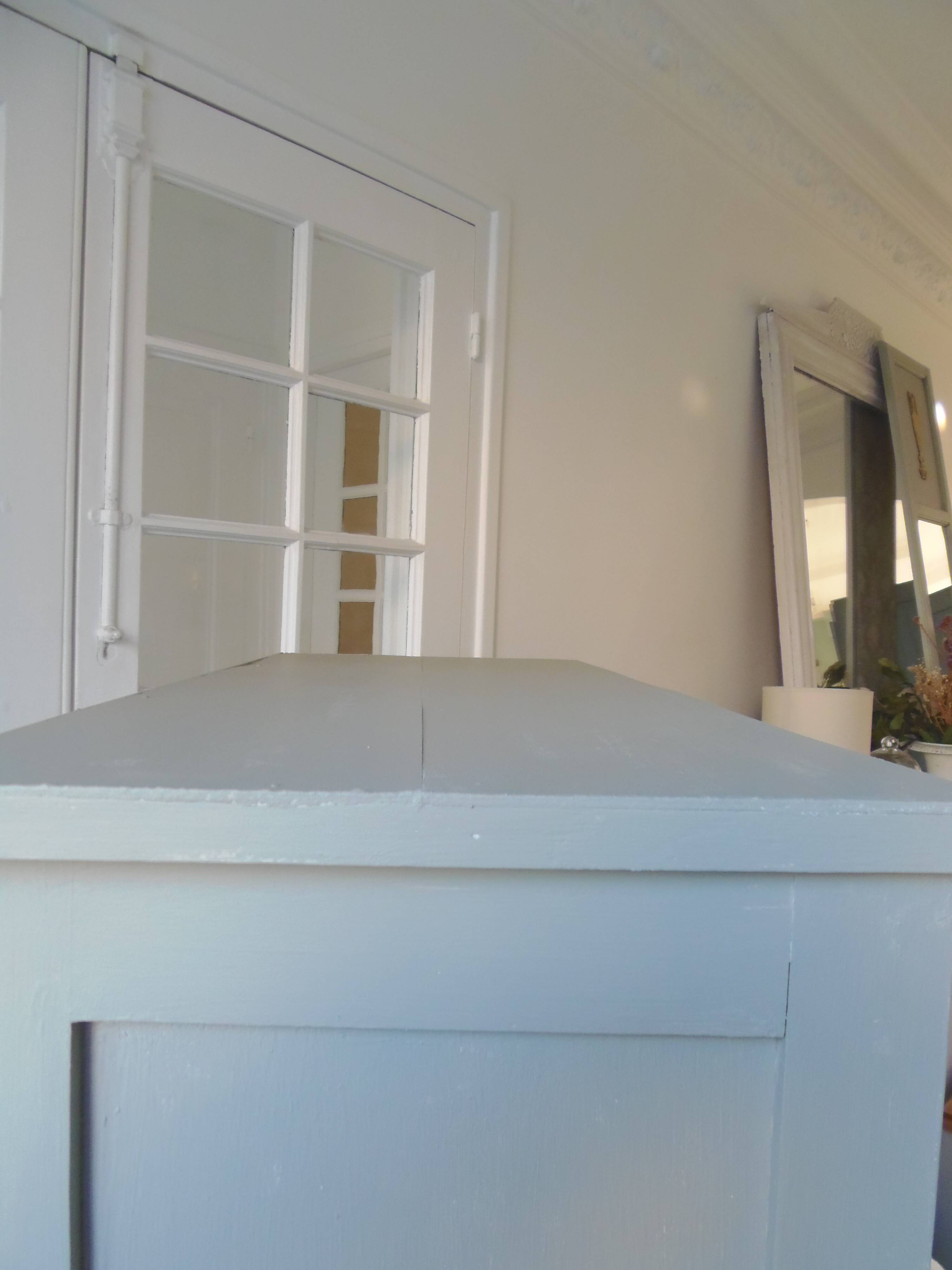 Vintage furniture transformed into a bookcase, verdigris patinated sideboard.