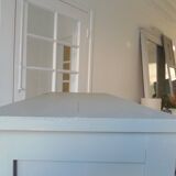 Vintage furniture transformed into a bookcase, verdigris patinated sideboard.