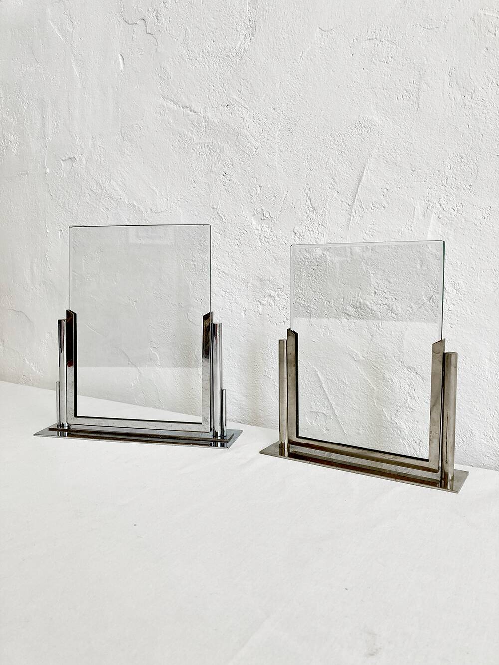 Duo of Art Deco photo frames in silver metal with beveled glass