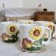 Set of 4 vintage barbotine cups / mugs with polychrome sunflower pattern