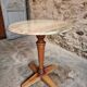 Vintage French bistro table in marble, walnut base, from 1920–1940.