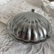 Shell-shaped butter dish in stainless steel and glass