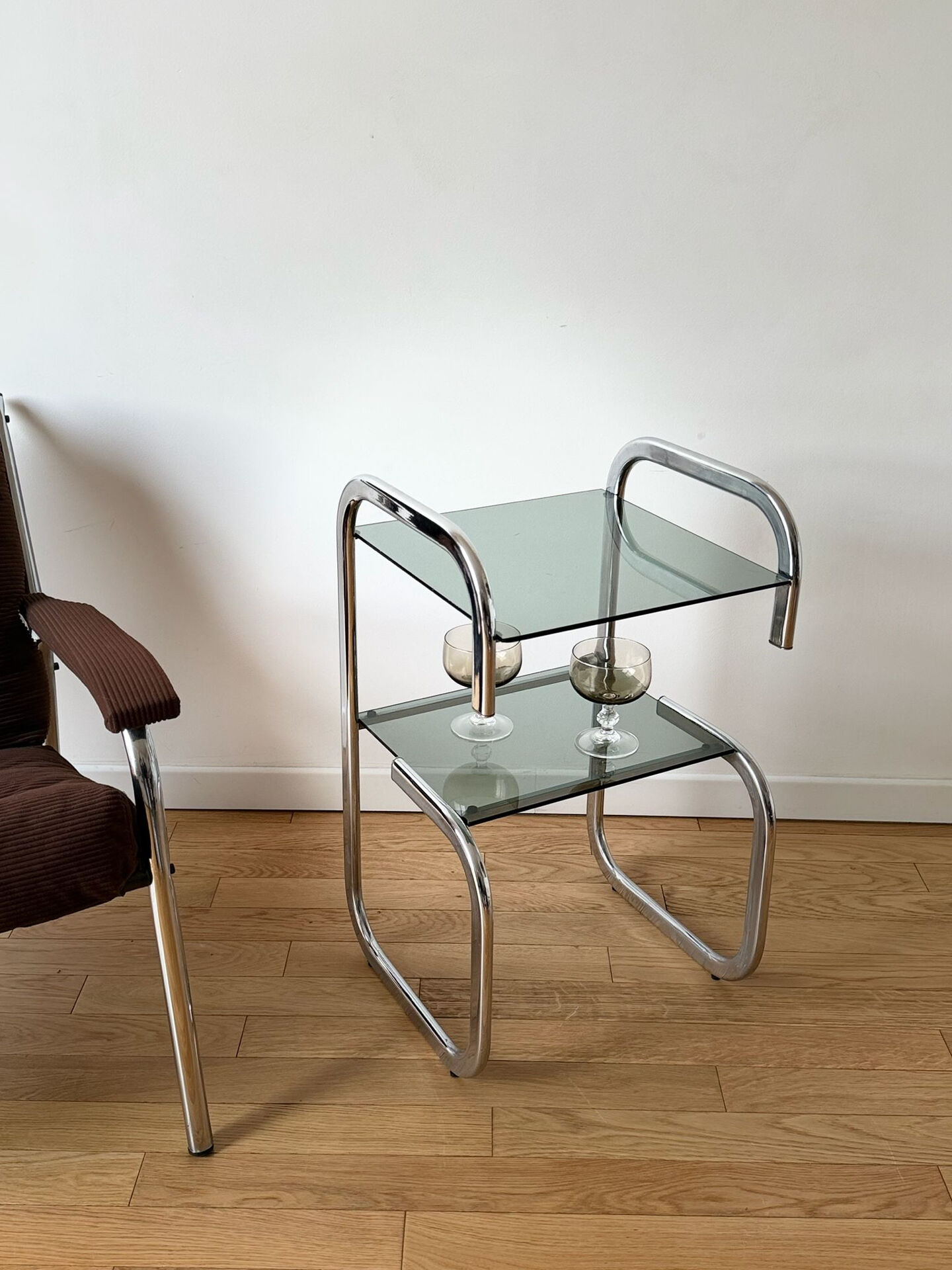Vintage side table in smoked glass and chrome