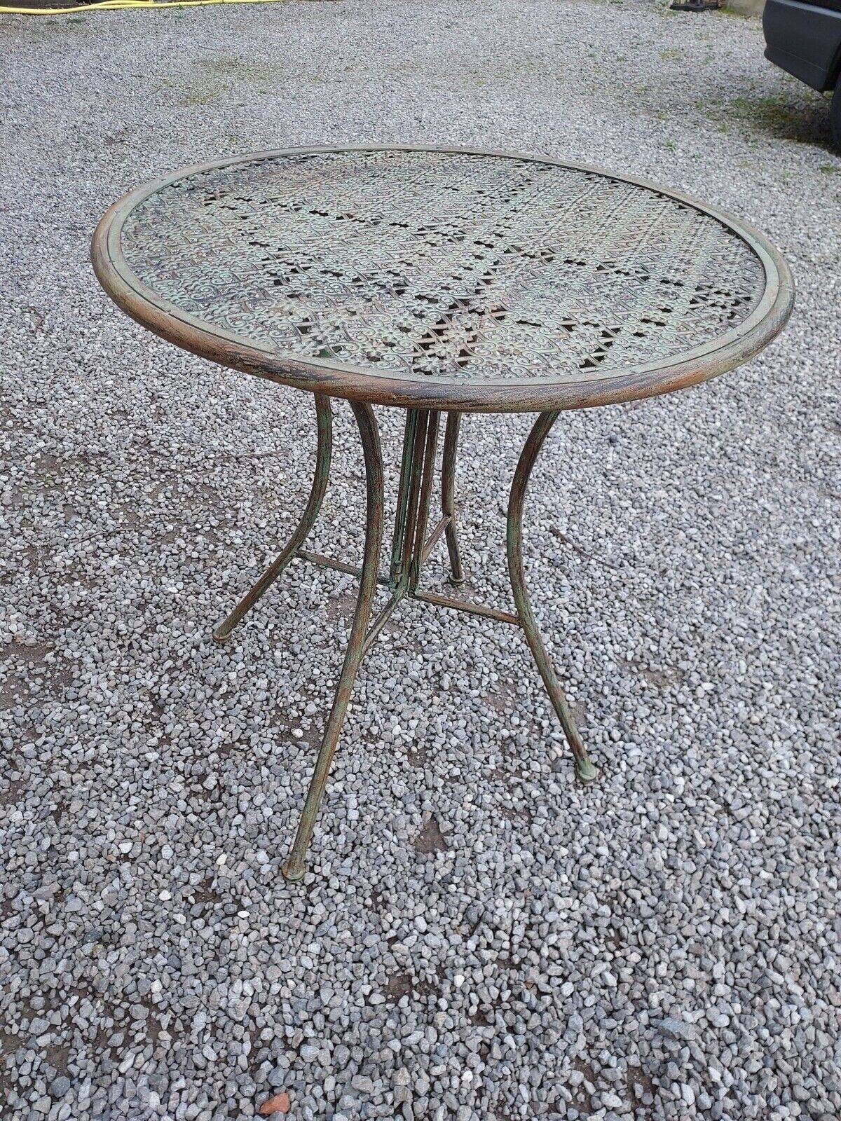 folding garden furniture in patinated iron