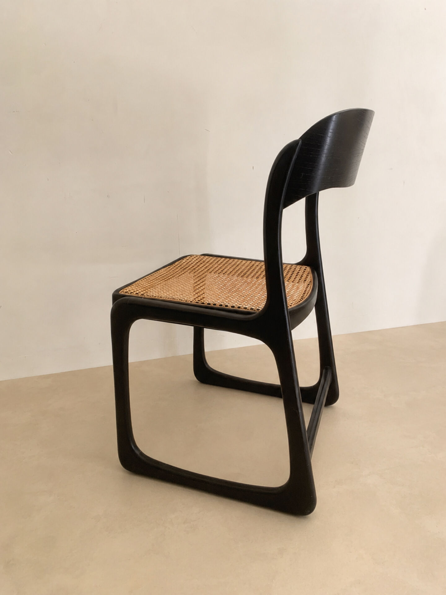 Set of 4 Baumann sled chairs with caning.