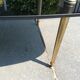 Glass and brass coffee table
