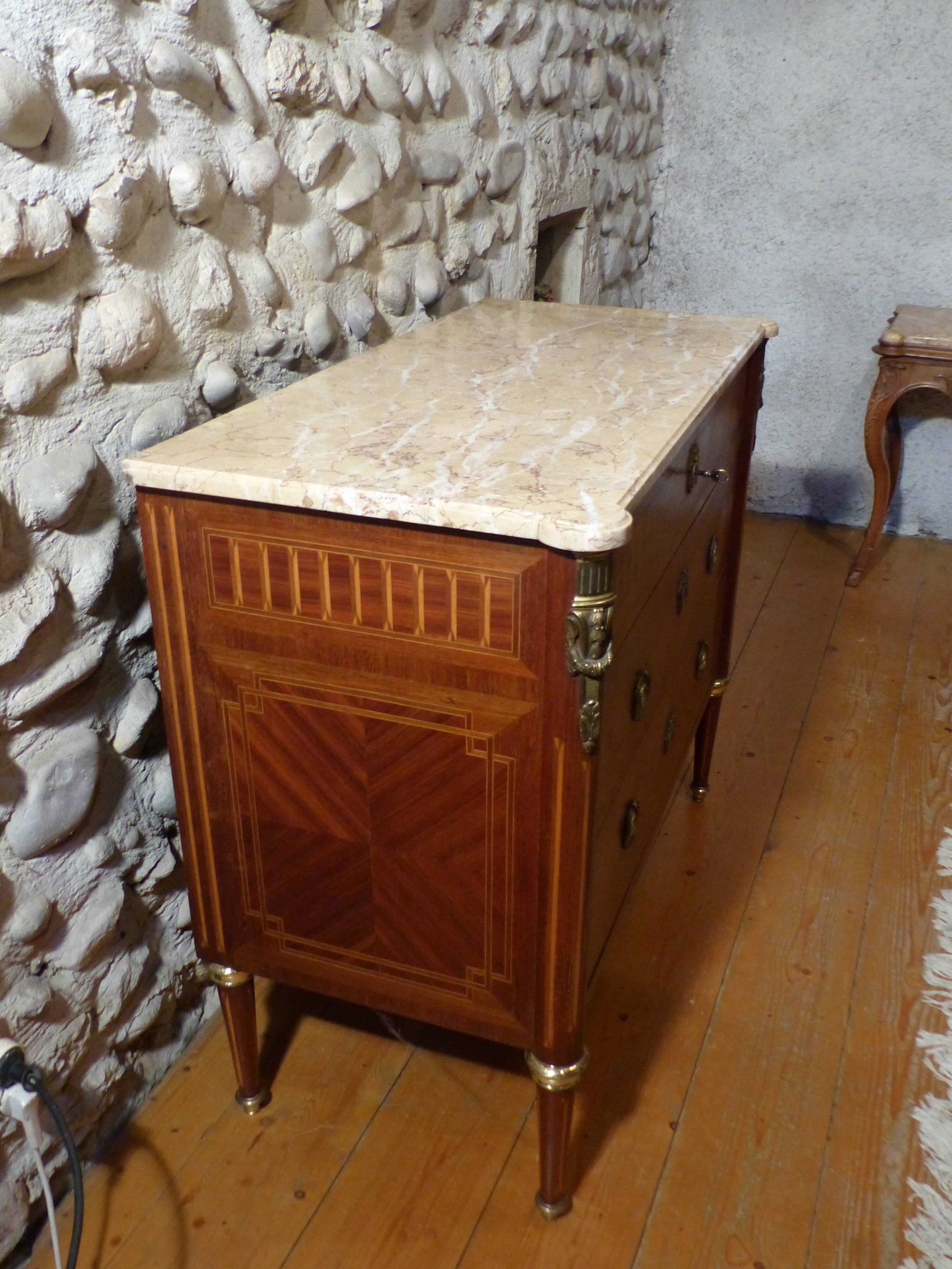 Louis XVI-style dresser marked on marble