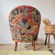 Small "madame" toad chair, vintage, upholstered in multicoloured floral fabric.