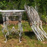 Ancient folded garden lounge in cast iron