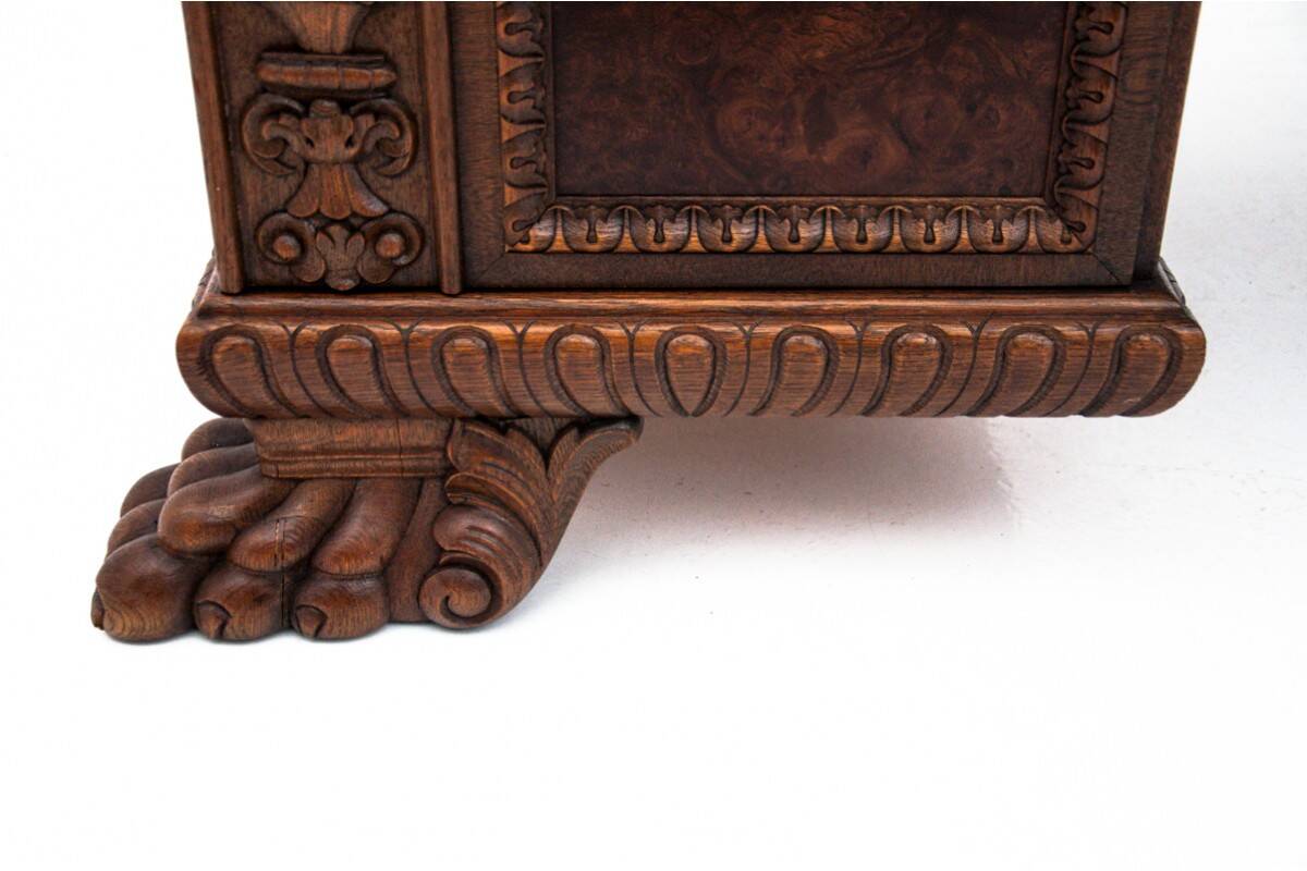 Cabinet set on lion's paws, Germany, early 20th century.