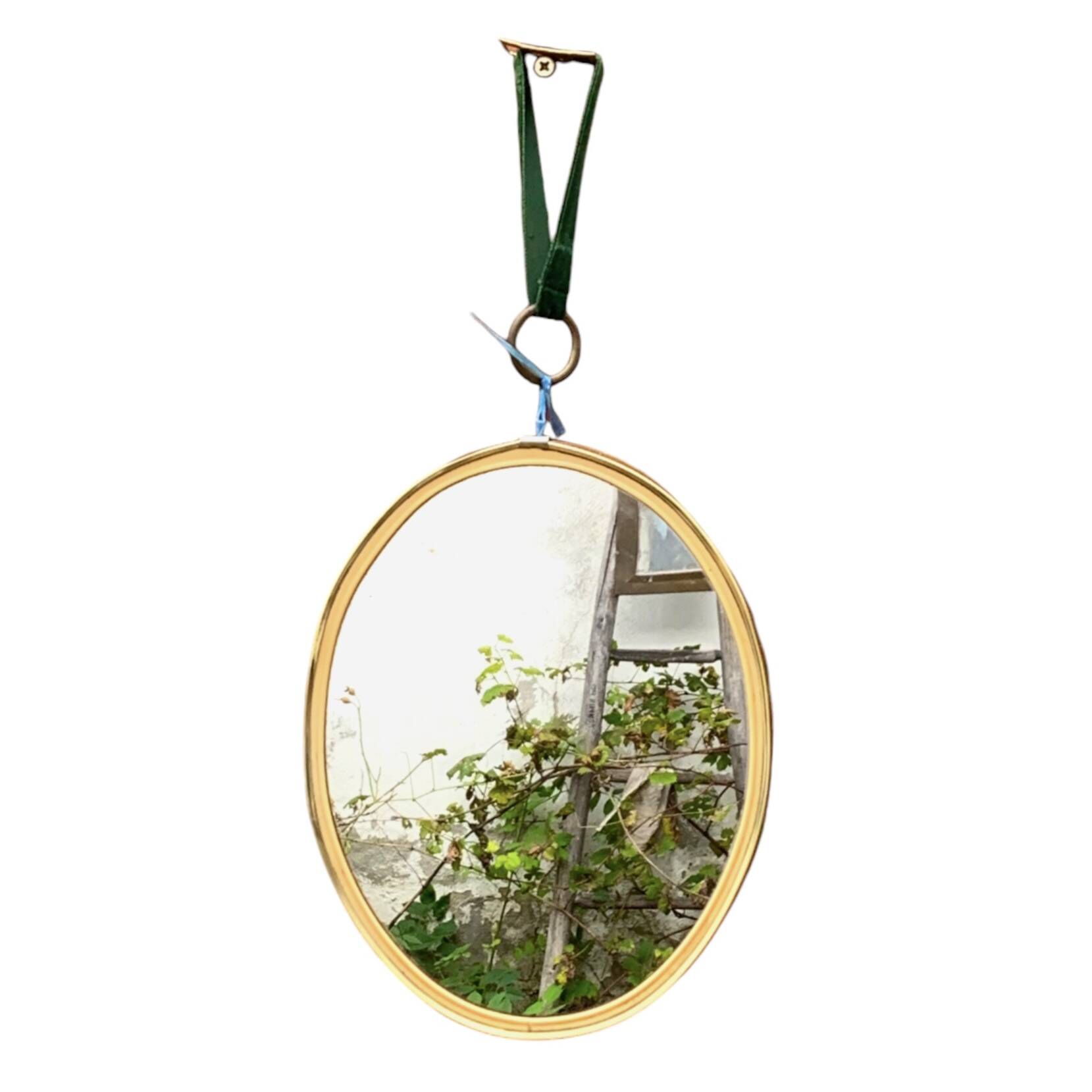 Oval medallion mirror 1960