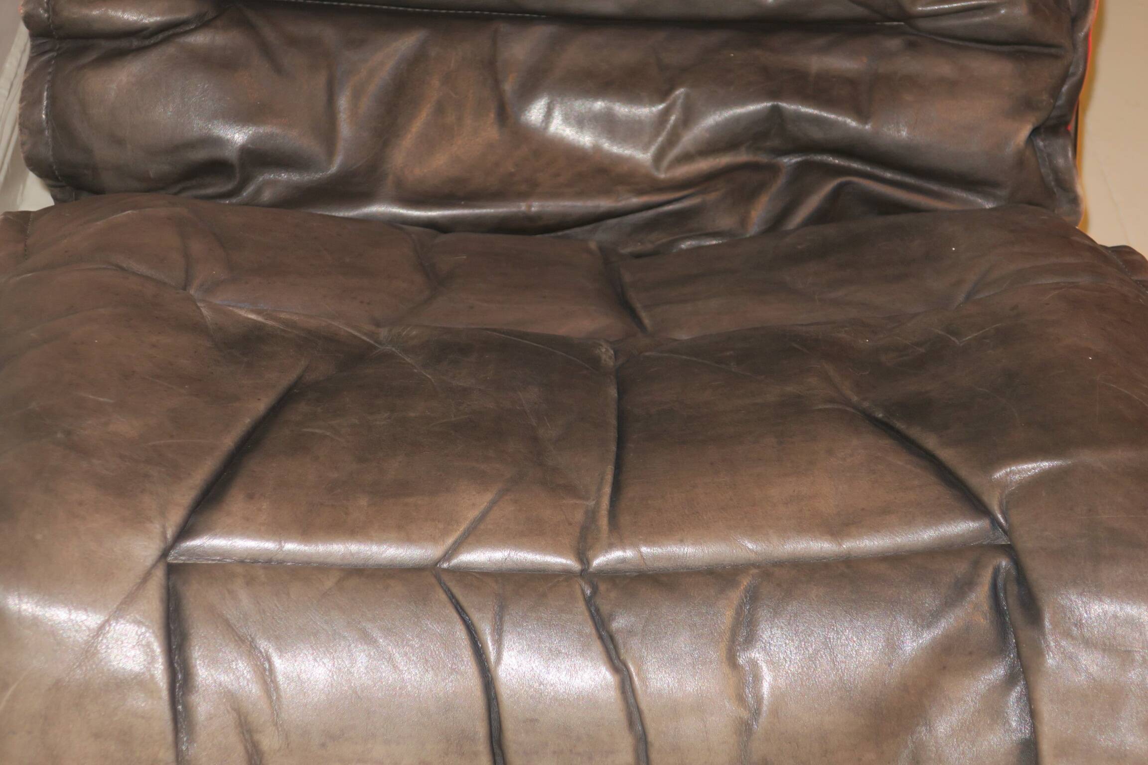 Ingmar Relling patinated leather lounge chair with ottoman, Norway 1960s
