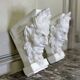 Pair of white statuary marble consoles, with faun heads