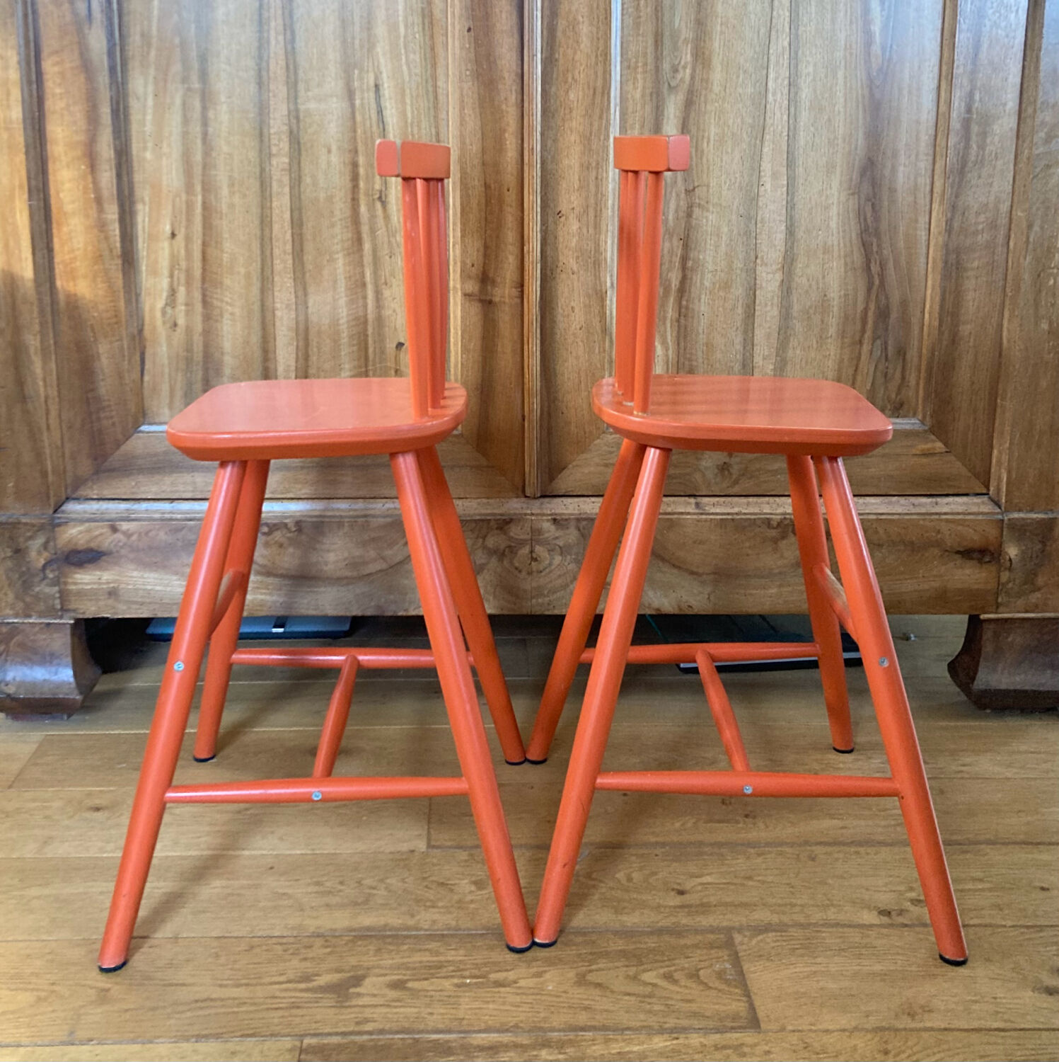 Vintage solid wood high chairs in Western style for children.