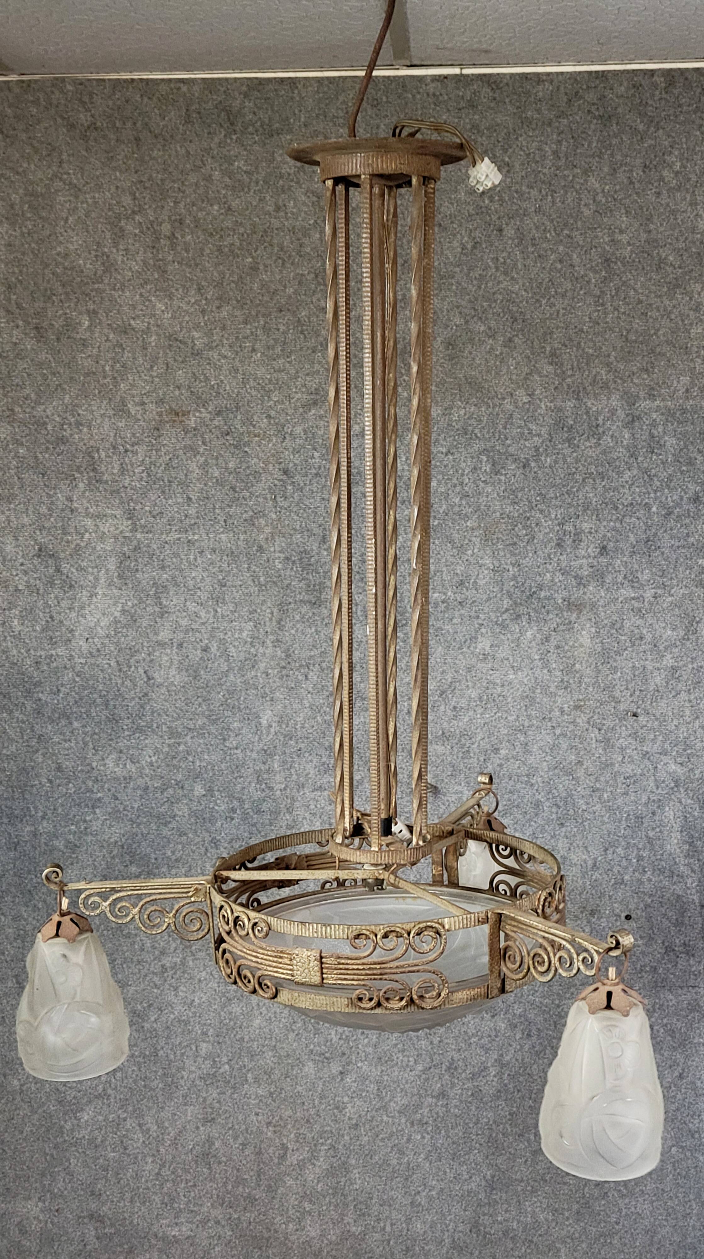 Large Art Deco chandelier, made of finely wrought wrought iron.