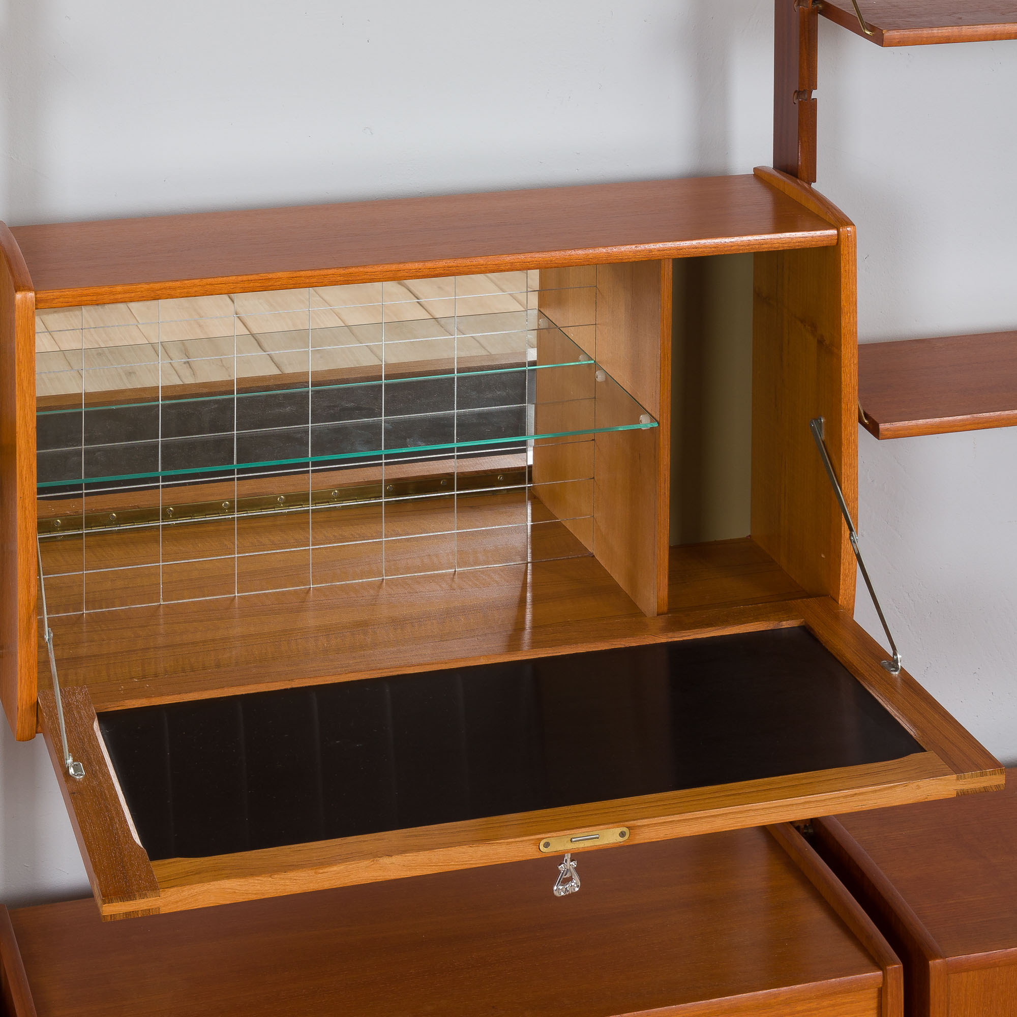 Scandinavian  free standing  Ergo wall unit bar cabinet and 3 cabinets and with 7 shelves,  by John