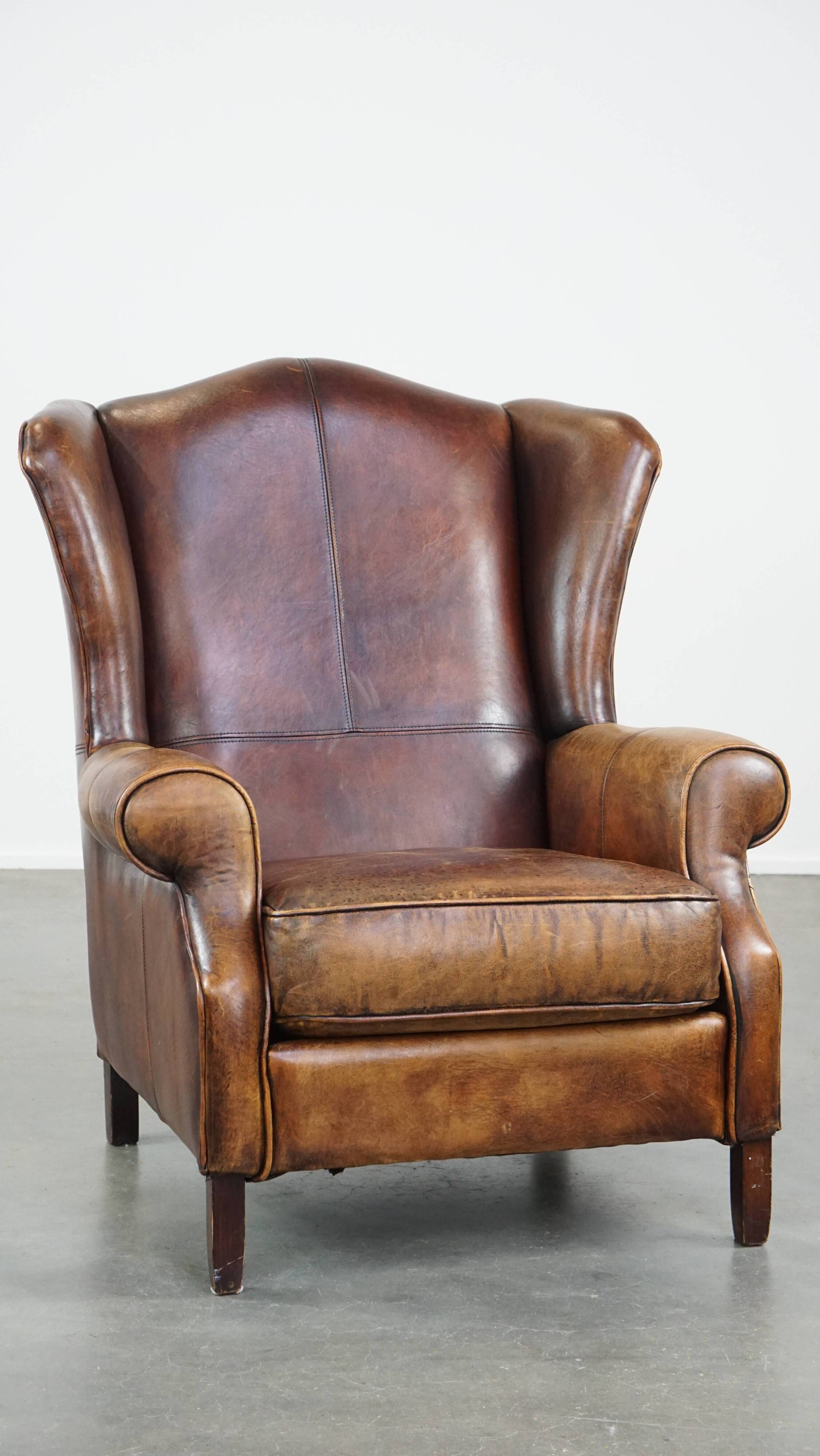Fauteuil à oreilles en cuir de mouton