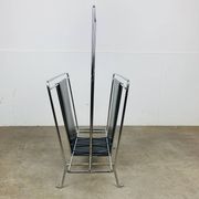 Chrome and black leather magazine rack, 1970s.