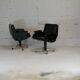 Pair of swivel armchairs, imitation leather and steel, Italy, circa 1960.