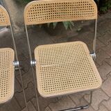 Plia chairs by Castelli in wood and cane.