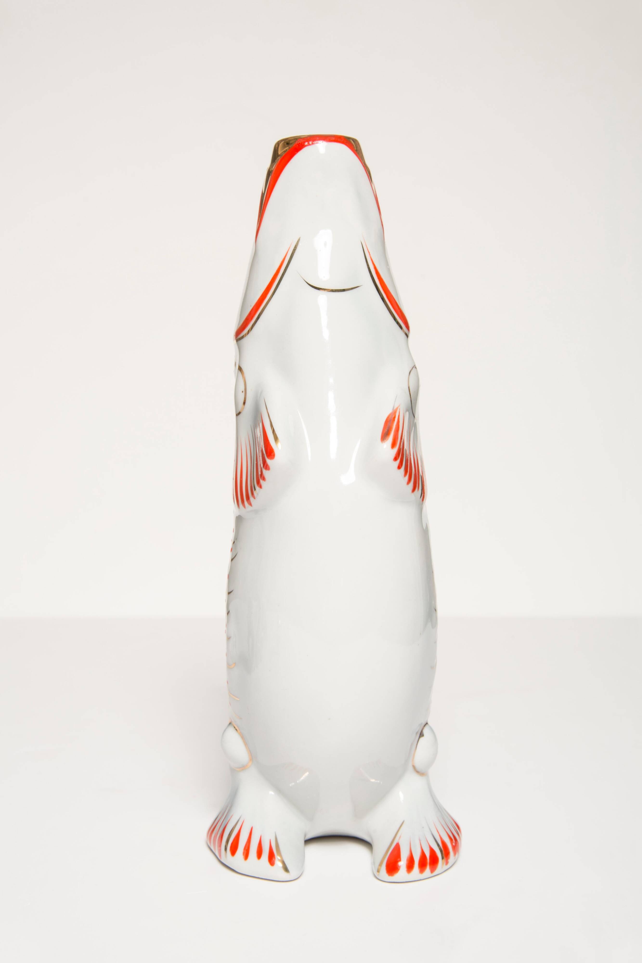 Set of 7 glasses and a glass carafe decorated with blue fish, Mid-Century Modern style, Europe, 1960s.