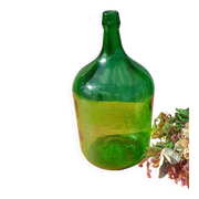 Superb antique green glass demijohn.