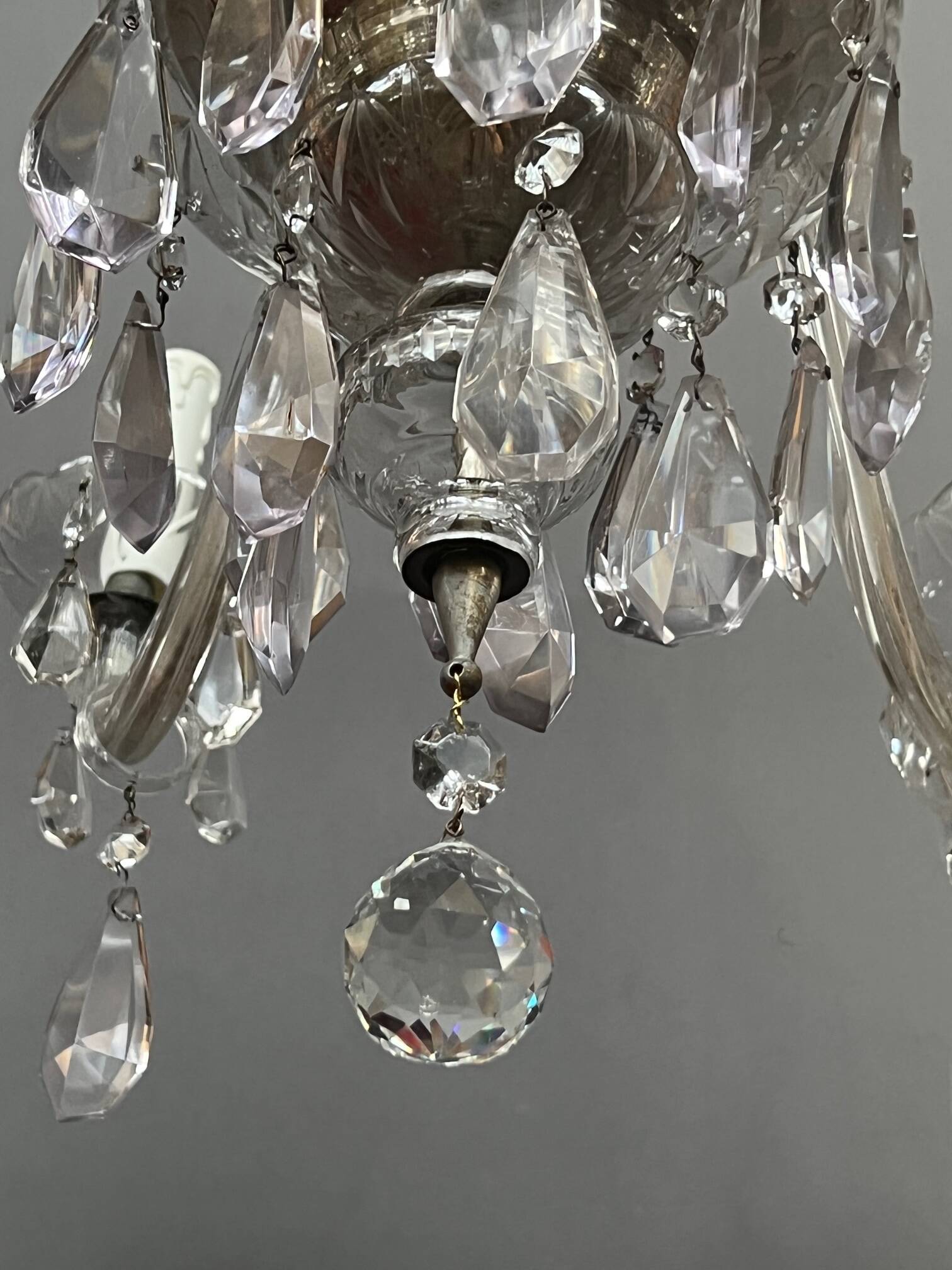 Venetian chandelier decorated with clear crystal and rare coloured crystal.