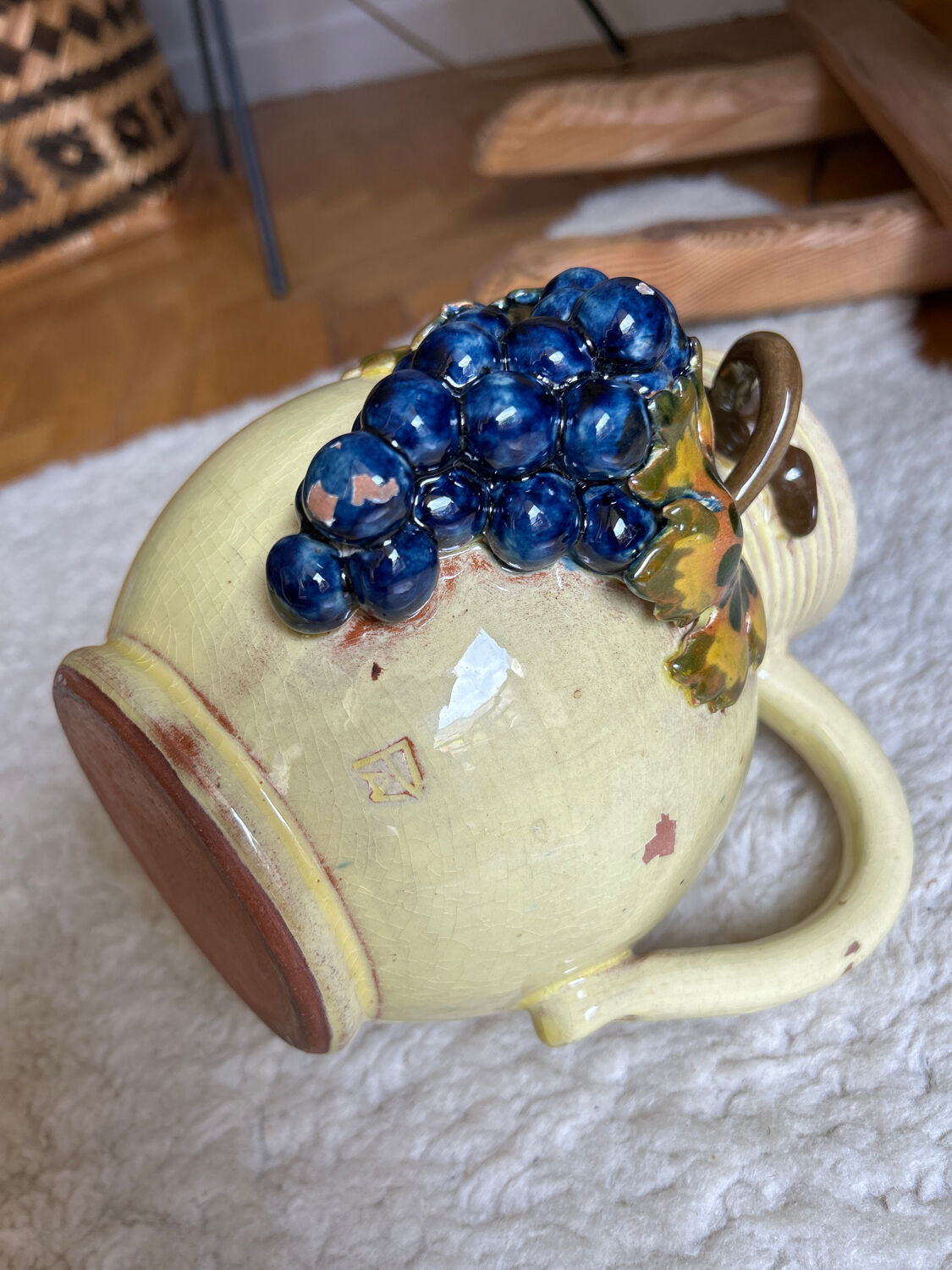 Earthenware jug/carafe HB with grape bunch slip decoration.