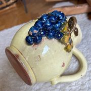 Earthenware jug/carafe HB with grape bunch slip decoration.